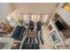 Living room with a fireplace, comfortable seating, and seamless access to the kitchen, creating an open concept at 22668 E Lake Pl, Centennial, CO 80015