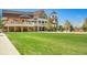 Beautiful clubhouse with a spacious lawn, perfect for outdoor events and community gatherings at 6880 S Yantley Ct, Aurora, CO 80016