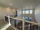 View of the main floor from the second-story landing at 2904 S Poppy St, Morrison, CO 80465