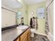 Well-lit bathroom with a shower-tub combination, and a modern vanity at 17950 E 54Th Ave, Denver, CO 80249