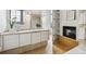 Bathroom with a modern vanity, stylish mirror, and built-in shelving and fireplace at 2000 Little Raven St # 4A, Denver, CO 80202