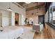 Bedroom with concrete accents and hardwood flooring, featuring a cozy seating area and a closet at 2000 Little Raven St # 4A, Denver, CO 80202