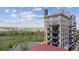 Multi-story building with brick accents, balconies, and beautiful views of the park and skyline at 2000 Little Raven St # 4A, Denver, CO 80202
