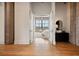 Elegant bedroom boasts hardwood floors and large windows providing ample natural light at 2000 Little Raven St # 4A, Denver, CO 80202