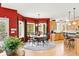 Charming breakfast nook with great outdoor view, kitchen access and decorative lighting at 30205 Telluride Ln, Evergreen, CO 80439