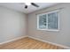 Bright bedroom with hardwood floors, ceiling fan, and window for natural light at 3355 S Flower St # 166, Lakewood, CO 80227