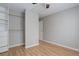 The bedroom features hardwood floors, a built-in closet and ample sunlight at 3355 S Flower St # 166, Lakewood, CO 80227