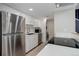 Well-equipped kitchen with stainless steel appliances and sleek countertops, creating a modern and functional space at 3355 S Flower St # 166, Lakewood, CO 80227