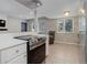Updated kitchen offers sleek appliances and opens to a living space, creating a modern, open feel at 3355 S Flower St # 166, Lakewood, CO 80227