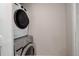 The laundry room features a stacked washer and dryer for convenience and space-saving efficiency at 3355 S Flower St # 166, Lakewood, CO 80227
