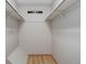 A spacious walk-in closet offers ample storage with its rods and shelves at 3355 S Flower St # 166, Lakewood, CO 80227