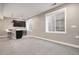 Finished basement featuring a bar area with a sink, dark cabinetry, and two basement windows at 10179 E 59Th North Pl, Denver, CO 80238