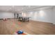Finished basement with light wood floors and a ping pong table, with a large open space for entertaining at 10179 E 59Th North Pl, Denver, CO 80238
