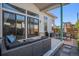 Outdoor patio with comfortable seating, grill, and a view of the backyard at 10179 E 59Th North Pl, Denver, CO 80238