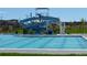 Community pool with a blue slide at 10179 E 59Th North Pl, Denver, CO 80238