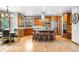 Spacious kitchen features an island with granite counters, wood cabinets, and stainless steel appliances at 5159 Serene View Way, Parker, CO 80134