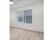 Large window in a spacious bedroom with carpet flooring and neutral walls at 1518 Whitehall Dr, Longmont, CO 80504