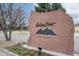 The 'Golden Bear' community sign with mountain graphic, marking a covenant-protected neighborhood at 1518 Whitehall Dr, Longmont, CO 80504