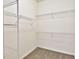 Walk-in closet with carpet and shelving for clothing and accessories at 1518 Whitehall Dr, Longmont, CO 80504