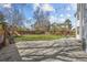Expansive backyard with a spacious patio and a lush lawn, perfect for outdoor entertaining at 5010 Apache Creek Rd, Castle Rock, CO 80109