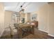 Modern dining room with updated flooring and a stylish light fixture at 5010 Apache Creek Rd, Castle Rock, CO 80109
