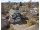 Attractive two-story home with a three-car garage and well-maintained landscaping in a suburban neighborhood at 5010 Apache Creek Rd, Castle Rock, CO 80109