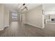 Open floorplan, featuring large windows and updated flooring throughout at 5010 Apache Creek Rd, Castle Rock, CO 80109