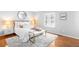 Cozy bedroom with plush carpet, large windows, and stylish furnishings at 6997 S Poplar Way, Centennial, CO 80112