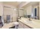 Practical bathroom with a tub-shower combination and neutral finishes at 1470 S Quebec Way # 244, Denver, CO 80231