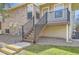 Exterior elevation showcasing the back entrance with stairs at 1470 S Quebec Way # 244, Denver, CO 80231
