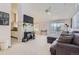 Spacious living room features a decorative fireplace and large windows at 1470 S Quebec Way # 244, Denver, CO 80231
