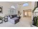 Sun-drenched living room with vaulted ceiling and a cozy seating area at 1470 S Quebec Way # 244, Denver, CO 80231