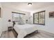 Comfortable bedroom with large windows and neutral decor at 4832 E Kentucky Ave # E, Denver, CO 80246