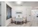 Cozy dining area with natural light and seating for two at 4832 E Kentucky Ave # E, Denver, CO 80246