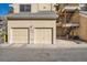 Street view of garages for each unit in this property at 4832 E Kentucky Ave # E, Denver, CO 80246