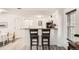 Open kitchen with eat-in bar, great for entertaining at 4832 E Kentucky Ave # E, Denver, CO 80246