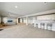 Finished basement with a modern bar area and comfortable lounge seating at 18212 W 95Th Pl, Arvada, CO 80007