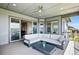 Outdoor deck area with comfortable seating perfect for relaxing and enjoying the views at 18212 W 95Th Pl, Arvada, CO 80007