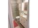 Bathroom featuring a modern vanity, toilet and glass enclosed shower at 8224 Washington St # 11, Denver, CO 80229