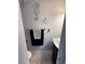 Quaint half bathroom with starfish decor, vessel sink, modern fixtures and tile flooring at 8224 Washington St # 11, Denver, CO 80229