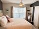 Inviting main bedroom with lots of natural light, neutral paint, and ceiling fan at 8224 Washington St # 11, Denver, CO 80229