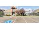 Community clubhouse boasts an attractive exterior, convenient parking, and welcoming accessibility features at 12920 Jasmine St # F, Thornton, CO 80602