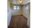 Small bedroom with neutral carpet and bright natural light; ideal for a guest room or office at 2902 Depew St, Wheat Ridge, CO 80214