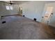 Large living room with neutral carpet and an open floor plan at 2902 Depew St, Wheat Ridge, CO 80214