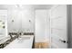 Bathroom featuring a dual sink vanity, modern fixtures, and a decorative backsplash at 5134 Quitman St, Denver, CO 80212