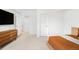 Bedroom with neutral carpet, television, and wood dresser at 5134 Quitman St, Denver, CO 80212