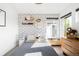 Cozy bedroom with unique patterned wallpaper and natural light at 5134 Quitman St, Denver, CO 80212