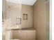 Modern tile shower with built in storage and rainfall shower head at 5134 Quitman St, Denver, CO 80212