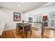 Dining room next to staircase with natural light and fireplace views at 479 Josephine St, Denver, CO 80206