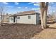 Charming exterior view of a well maintained house with a freshly mulched lawn at 1227 Yost St, Aurora, CO 80011